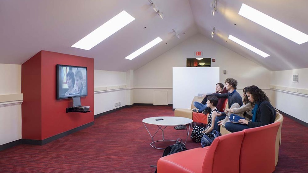 Students watching TV in lounge
