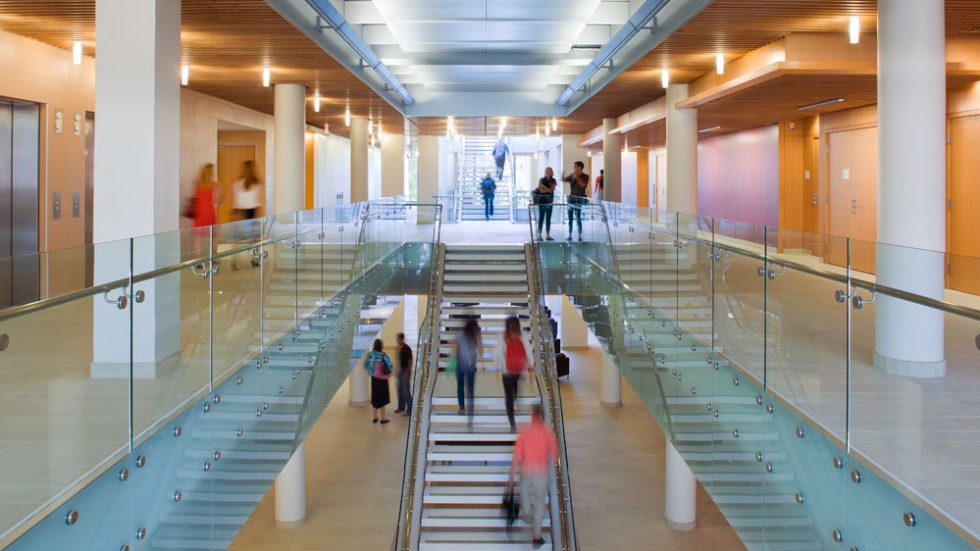 People walking up staircase